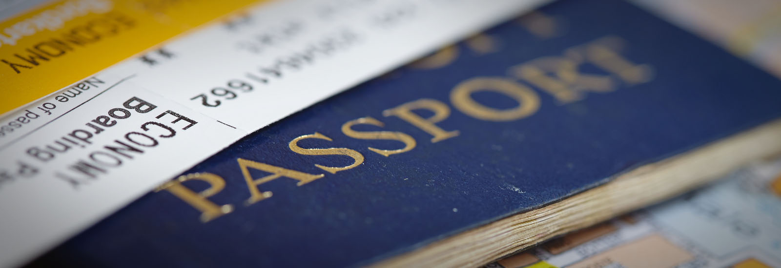 Close up of passport and boarding pass